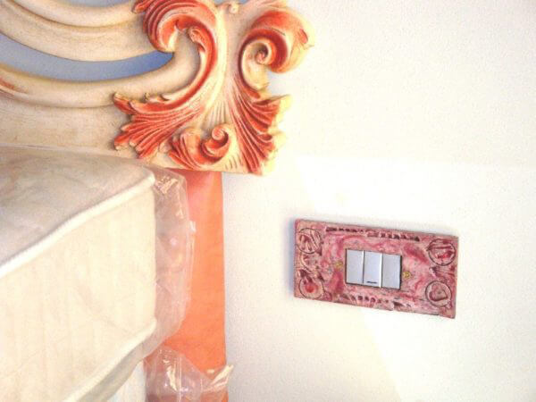 Copriprese in ceramica