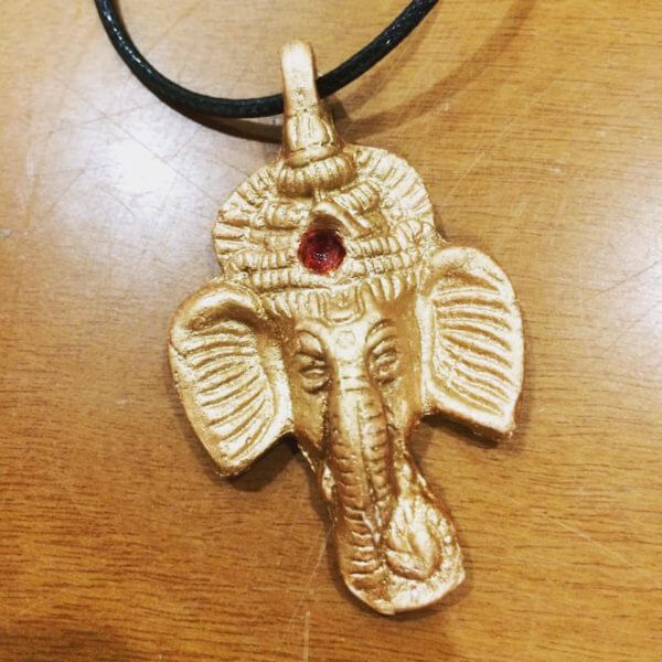 "Ganesha in ceramica metallizzata"