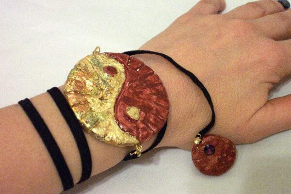 Bracciale yin-yang Rosso e foglia oro
